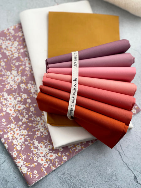 Lo and Behold Stitchery's fabric bundle kit - ‘Celtic Crossing’ Quilt in baby size  (Mauve Sunset)