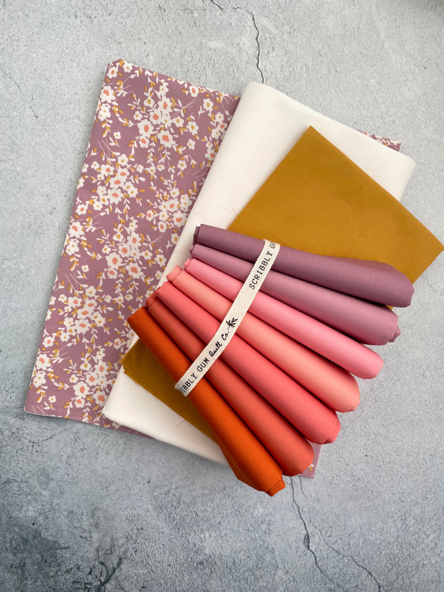 Lo and Behold Stitchery's fabric bundle kit - ‘Celtic Crossing’ Quilt in baby size  (Mauve Sunset)